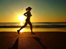 image of woman running in the morning